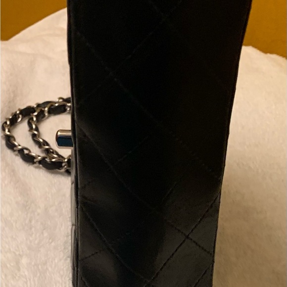 Authentic classic Chanel black double flap handbag with silver hardware. - Picture 15 of 16